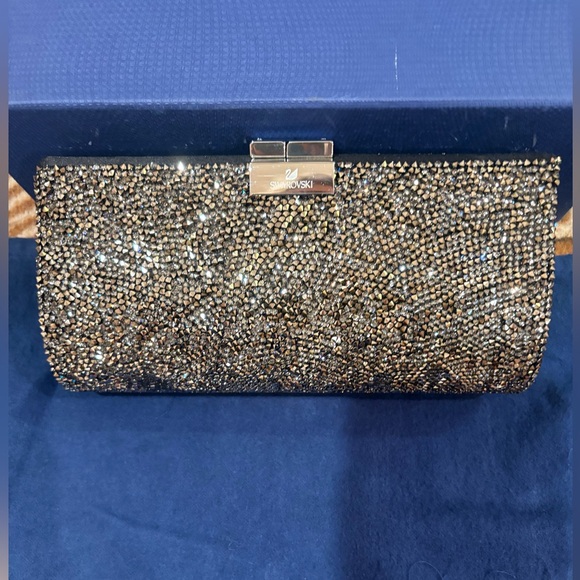 Swarovski Crystal-Embellished Black and Silver Clutch
New in original box - Picture 1 of 5